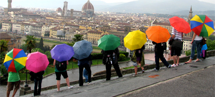 An Explorica tour group with umbrellas in Florence, Italy